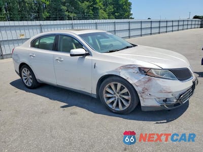 Czwarte zdjęcie samochodu z boku: 2015 LINCOLN MKS VIN:1LNHL9DK3FG603448 - miniatura