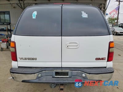 Zdjęcie 6 z 14 samochodu: 2000 GMC YUKON VIN:1GKEK13T0YJ211639 - miniatura