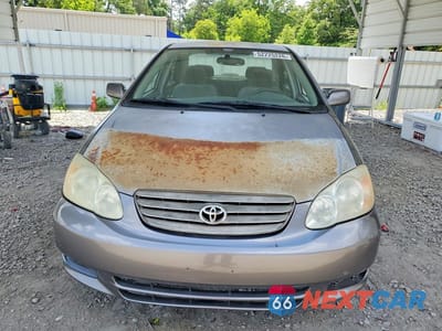 Piąte zdjęcie samochodu w środku: 2003 TOYOTA COROLLA LE VIN:1NXBR32E13Z131004 - miniatura