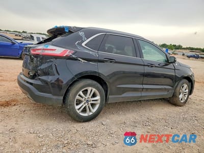 Trzecie zdjęcie samochodu z tyłu: 2020 FORD EDGE SEL VIN:2FMPK3J99LBA58064 - miniatura