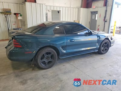 Trzecie zdjęcie samochodu z tyłu: 1994 FORD MUSTANG VIN:1FALP4049RF123119 - miniatura