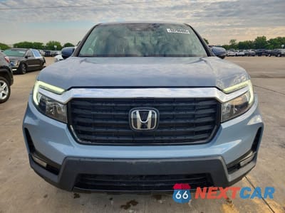 Piąte zdjęcie samochodu w środku: 2022 HONDA RIDGELINE RTL VIN:5FPYK3F73NB503279 - miniatura