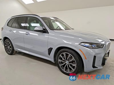 Czwarte zdjęcie samochodu z boku: 2026 BMW X5 XDRIVE40I VIN:5UX23EU01T9195838 - miniatura