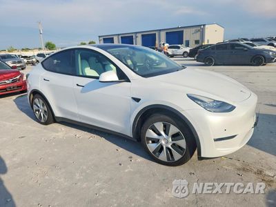 Czwarte zdjęcie samochodu z boku: 2022 TESLA MODEL Y VIN:7SAYGAEE8NF382606 - miniatura