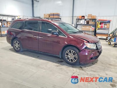 Czwarte zdjęcie samochodu z boku: 2011 HONDA ODYSSEY EXL VIN:5FNRL5H63BB031994 - miniatura