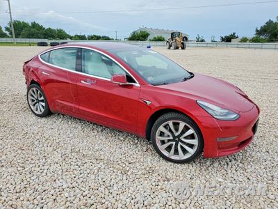 Czwarte zdjęcie samochodu z boku: 2018 TESLA MODEL 3 VIN:5YJ3E1EB5JF097441 - miniatura