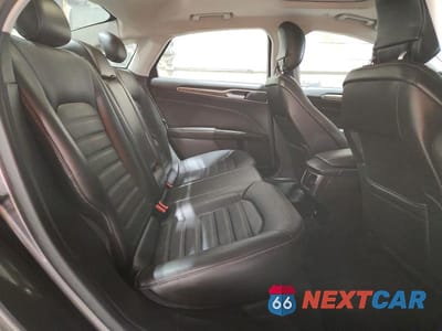 Zdjęcie 10 z 12 samochodu: 2013 FORD FUSION SE HYBRID VIN:3FA6P0LU2DR227271 - miniatura