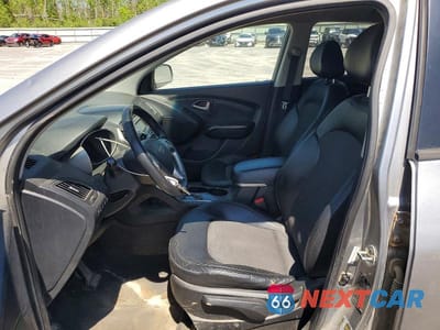 Zdjęcie 7 z 13 samochodu: 2013 HYUNDAI TUCSON GLS VIN:KM8JUCAC6DU568539 - miniatura