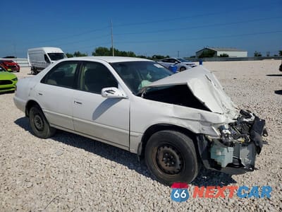 Czwarte zdjęcie samochodu z boku: 1999 TOYOTA CAMRY LE VIN:JT2BG22K6X0277284 - miniatura