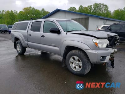 Czwarte zdjęcie samochodu z boku: 2014 TOYOTA TACOMA V6 VIN:3TMMU4FN5EM070811 - miniatura