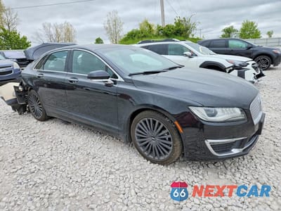 Czwarte zdjęcie samochodu z boku: 2017 LINCOLN MKZ HYBRID RESERVE VIN:3LN6L5MUXHR653339 - miniatura