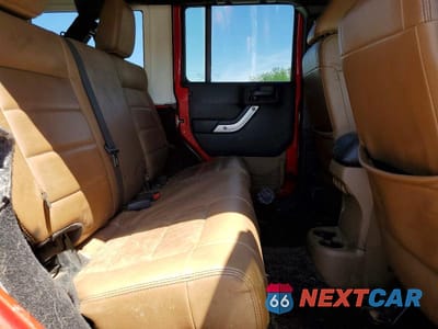 Zdjęcie 11 z 13 samochodu: 2012 JEEP WRANGLER UNLIMITED RUBICON VIN:1C4HJWFG0CL100108 - miniatura