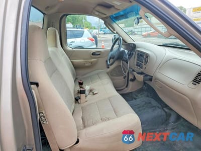 Zdjęcie 10 z 12 samochodu: 2002 FORD F150 VIN:1FTRF17282NB74407 - miniatura