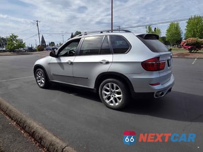 Czwarte zdjęcie samochodu z boku: 2011 BMW X5 XDRIVE35I VIN:5UXZV4C50BL410739 - miniatura