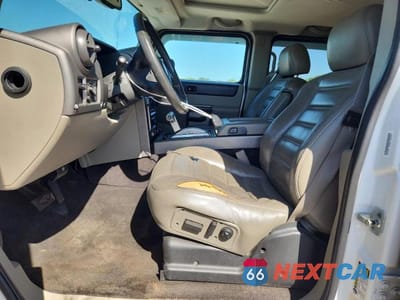 Zdjęcie 7 z 13 samochodu: 2004 HUMMER H2 VIN:5GRGN23U44H122571 - miniatura