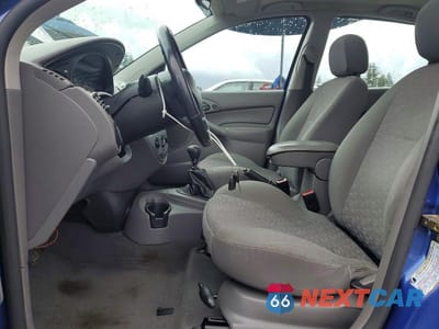 Zdjęcie 7 z 12 samochodu: 2004 FORD FOCUS ZX5 VIN:3FAFP37304R112400 - miniatura