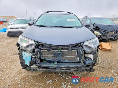 Piąte zdjęcie samochodu w środku: 2017 TOYOTA RAV4 HYBRID XLE VIN:JTMRJREV2HD109156 - miniatura
