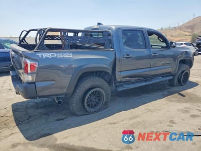 Trzecie zdjęcie samochodu z tyłu: 2023 TOYOTA TACOMA TRD OFF-ROAD VIN:3TMCZ5AN5PM565992 - miniatura