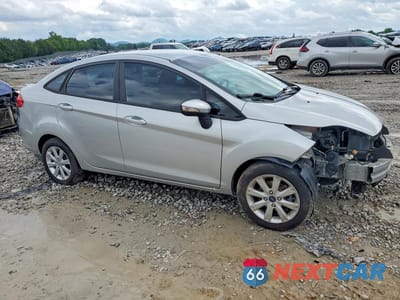 Czwarte zdjęcie samochodu z boku: 2013 FORD FIESTA SE VIN:3FADP4BJ3DM176186 - miniatura