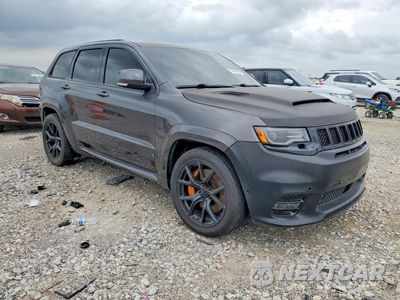 Czwarte zdjęcie samochodu z boku: 2015 JEEP GRAND CHEROKEE SRT-8 VIN:1C4RJFBT0DC520251 - miniatura