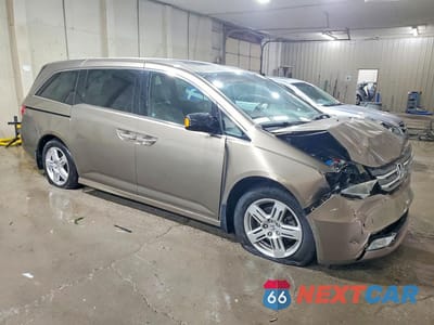 Czwarte zdjęcie samochodu z boku: 2012 HONDA ODYSSEY TOURING VIN:5FNRL5H97CB081664 - miniatura