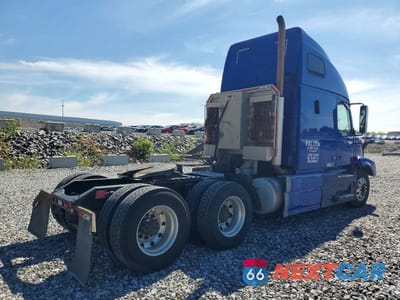 Czwarte zdjęcie samochodu z boku: 2016 VOLVO VN VNL VIN:4V4NC9TH3GN938613 - miniatura
