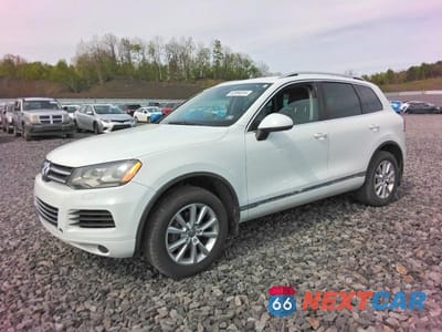 2014 VOLKSWAGEN TOUAREG V6 TDI WVGEP9BP6ED013038 - główne zdjęcie licytacji z USA - miniatura