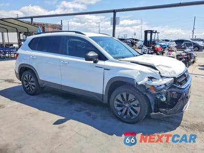 Czwarte zdjęcie samochodu z boku: 2023 VOLKSWAGEN TAOS S VIN:3VVCX7B20PM330763 - miniatura