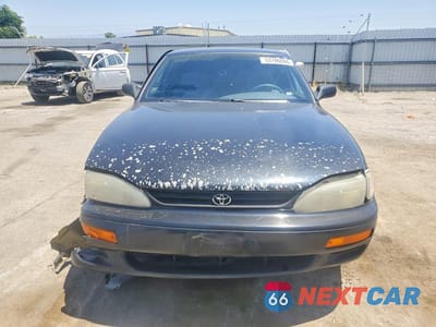 Piąte zdjęcie samochodu w środku: 1995 TOYOTA CAMRY LE VIN:4T1GK12E2SU079976 - miniatura