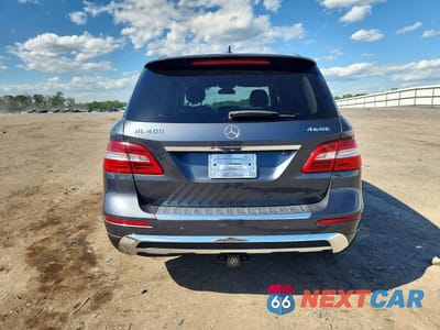 Zdjęcie 6 z 13 samochodu: 2015 MERCEDES-BENZ ML 400 4MATIC VIN:4JGDA5GB2FA496534 - miniatura