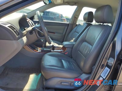 Zdjęcie 7 z 12 samochodu: 2002 TOYOTA CAMRY XLE VIN:4T1BE32K62U565015 - miniatura