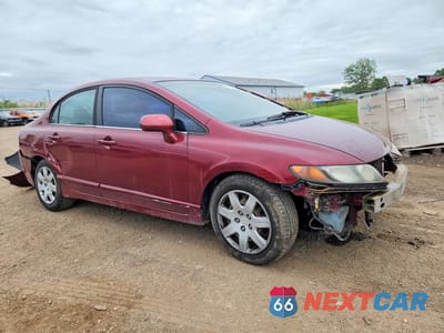 Czwarte zdjęcie samochodu z boku: 2006 HONDA CIVIC VIN:1HGFA165X6L145913 - miniatura