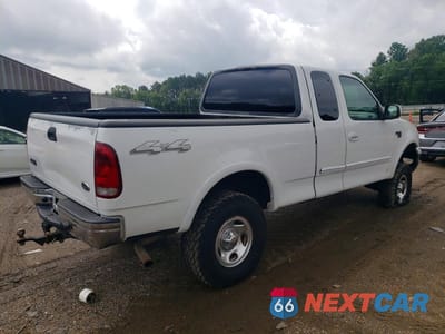 Trzecie zdjęcie samochodu z tyłu: 1999 FORD F150 VIN:1FTRX18L3XNA64179 - miniatura