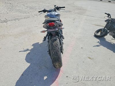 Czwarte zdjęcie samochodu z boku: 2014 TRIUMPH MOTORCYCLE STREET TRIPLE R VIN:SMTL03NE6ET656889 - miniatura