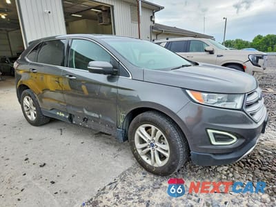 Czwarte zdjęcie samochodu z boku: 2018 FORD EDGE SEL VIN:2FMPK4J86JBB39436 - miniatura
