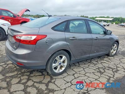 Trzecie zdjęcie samochodu z tyłu: 2014 FORD FOCUS SE VIN:1FADP3F21EL446855 - miniatura