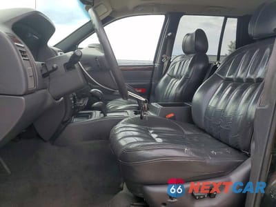 Zdjęcie 7 z 13 samochodu: 2000 JEEP GRAND CHEROKEE LIMITED VIN:1J4GW58N5YC114901 - miniatura