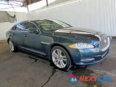 Czwarte zdjęcie samochodu z boku: 2013 JAGUAR XJL PORTFOLIO VIN:SAJWA2GB1DLV42711 - miniatura
