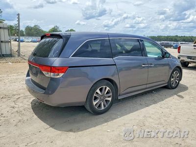Trzecie zdjęcie samochodu z tyłu: 2014 HONDA ODYSSEY TOURING VIN:5FNRL5H94EB094875 - miniatura