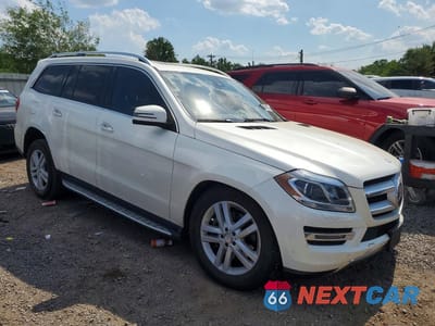 Czwarte zdjęcie samochodu z boku: 2016 MERCEDES-BENZ GL 450 4MATIC VIN:4JGDF6EEXGA659632 - miniatura