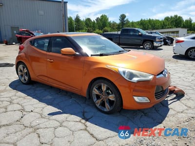 Czwarte zdjęcie samochodu z boku: 2012 HYUNDAI VELOSTER BASE VIN:KMHTC6AD6CU023641 - miniatura