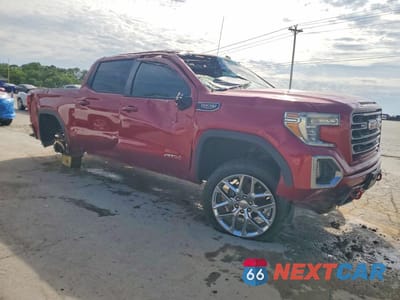 Czwarte zdjęcie samochodu z boku: 2019 GMC SIERRA K1500 AT4 VIN:3GTP9EEL5KG251616 - miniatura