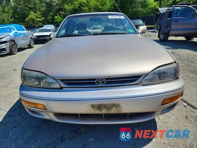 Piąte zdjęcie samochodu w środku: 1995 TOYOTA CAMRY DX VIN:JT2SK11E2S0326624 - miniatura