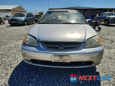 Piąte zdjęcie samochodu w środku: 2003 HONDA CIVIC LX VIN:1HGEM22543L031058 - miniatura