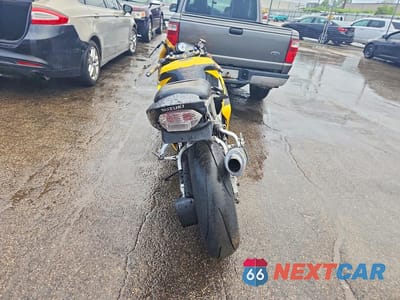 Czwarte zdjęcie samochodu z boku: 2002 SUZUKI GSX-R750 VIN:JS1GR7HA122104458 - miniatura