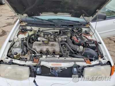 Zdjęcie 11 z 12 samochodu: 1995 FORD ESCORT LX VIN:3FASP13J2SR125587 - miniatura