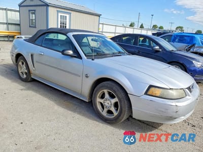 Czwarte zdjęcie samochodu z boku: 2004 FORD MUSTANG VIN:1FAFP44664F147461 - miniatura