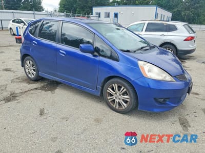 Czwarte zdjęcie samochodu z boku: 2010 HONDA FIT SPORT VIN:JHMGE8H48AS013864 - miniatura
