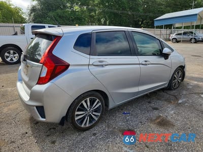Trzecie zdjęcie samochodu z tyłu: 2015 HONDA FIT EX VIN:3HGGK5H81FM756928 - miniatura