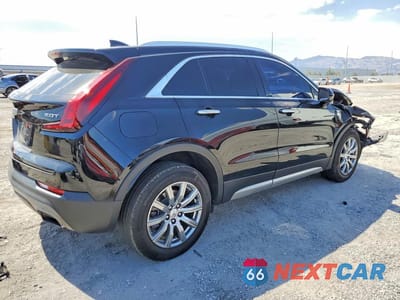 Trzecie zdjęcie samochodu z tyłu: 2019 CADILLAC XT4 PREMIUM LUXURY VIN:1GYFZCR40KF155696 - miniatura